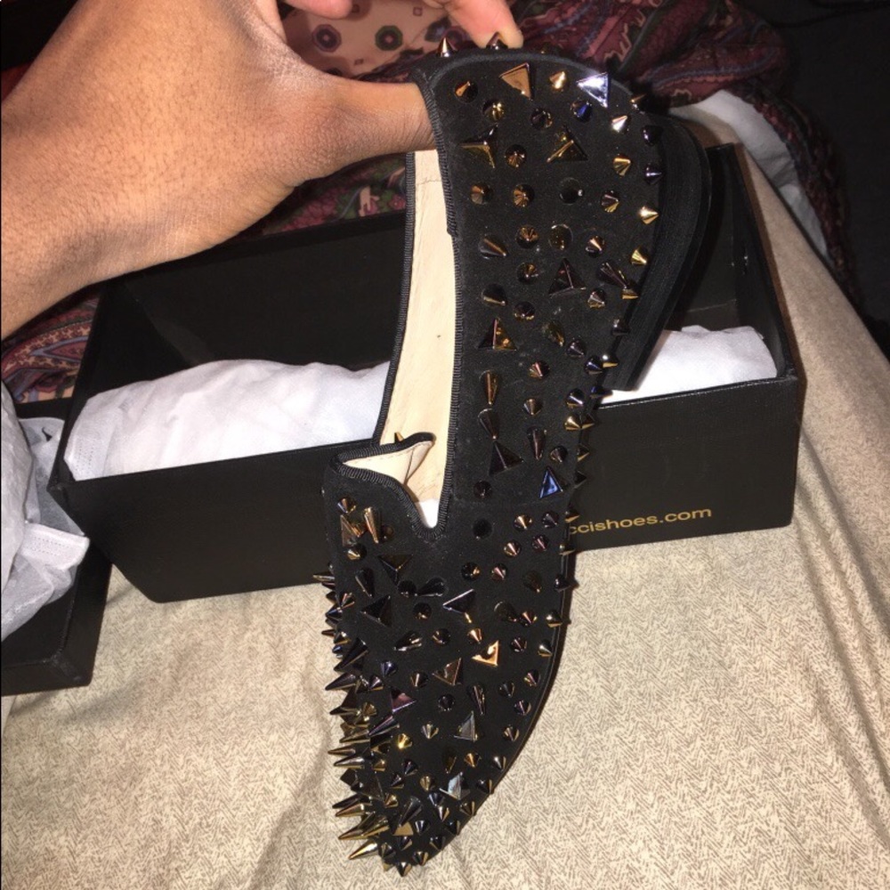 Black Ferucci red bottom shoes